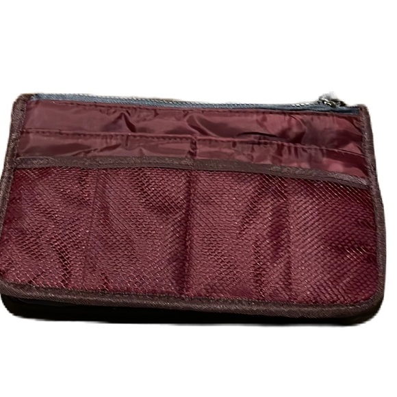 Travel maroon toiletry bag. 10” long by 6” tall. - Picture 1 of 9